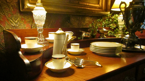 close up of dishes on a sideboard